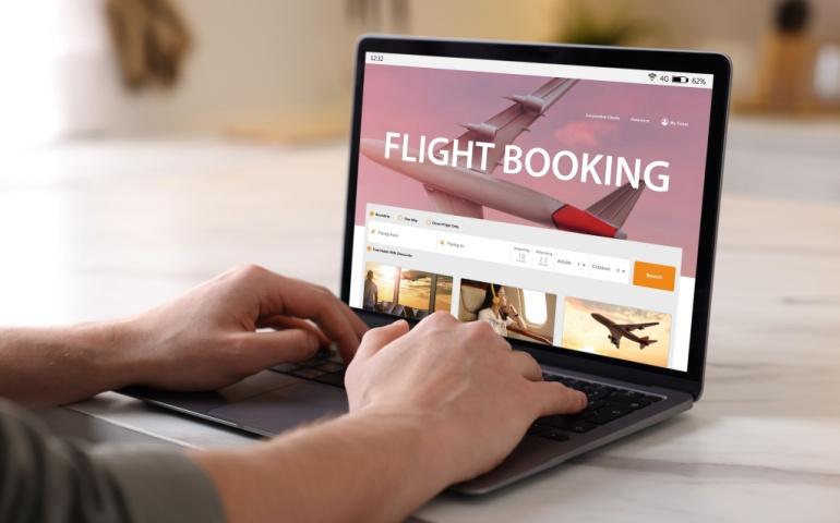 Man booking a flight online Image credit: Shutterstock/New Africa