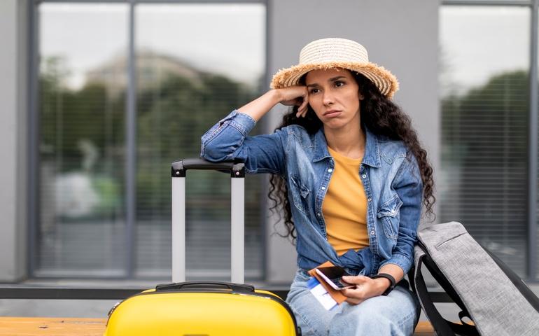 Woman disappointed because of flight cancellation