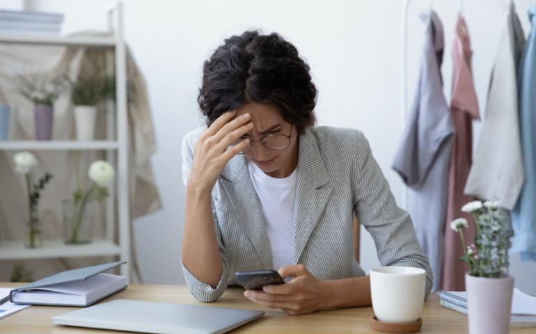 Young woman waiting for her refund 