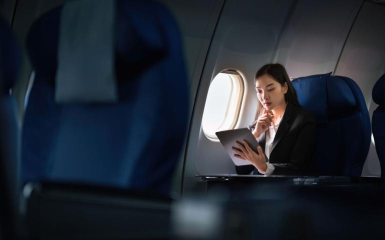 Businesswoman travelling by flight 