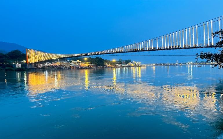 Ram Jhula bridge across the river Ganga, City of Rishikesh in the Indian State of Uttarakhand