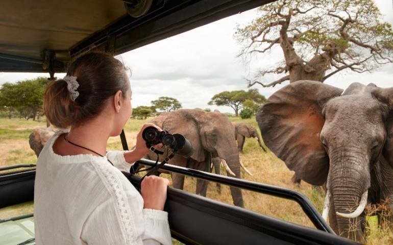 Woman tourist on a safari in Kenya