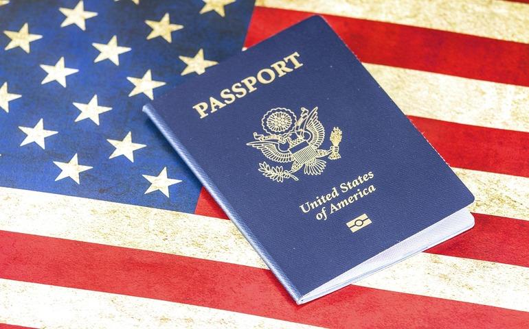 USA Passport with the flag as the background