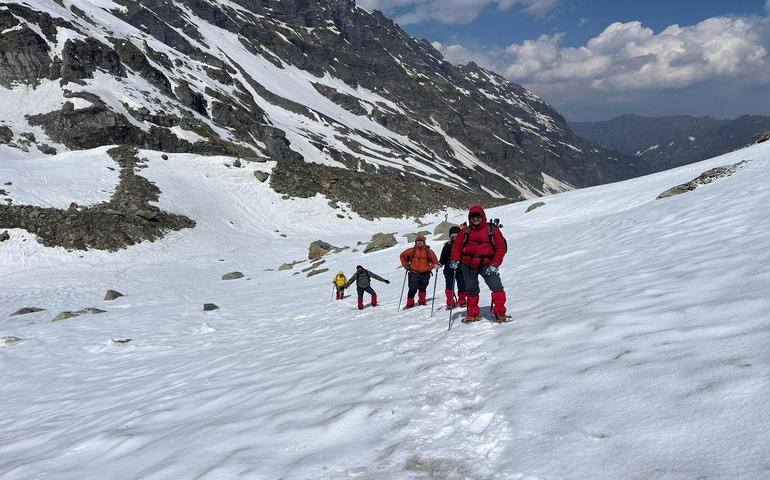 Trekking Through Snowy Hampta Pass in Himalayas