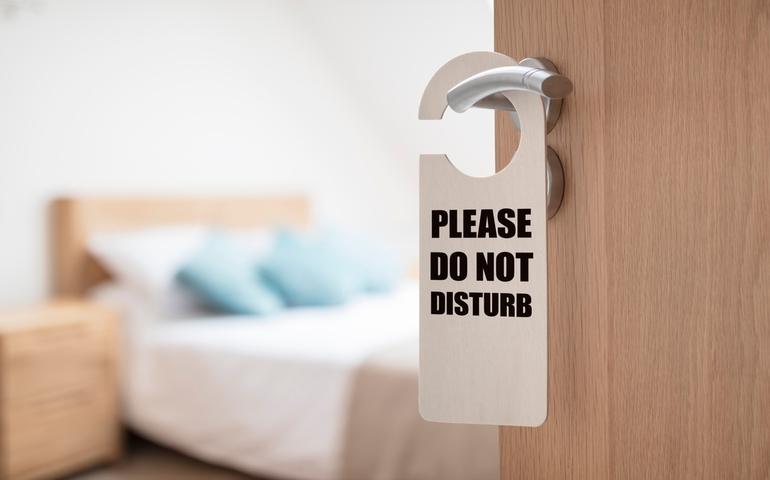 Do not disturb sign on hotel room