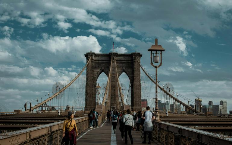 People Walking at the Brooklyn Bridge