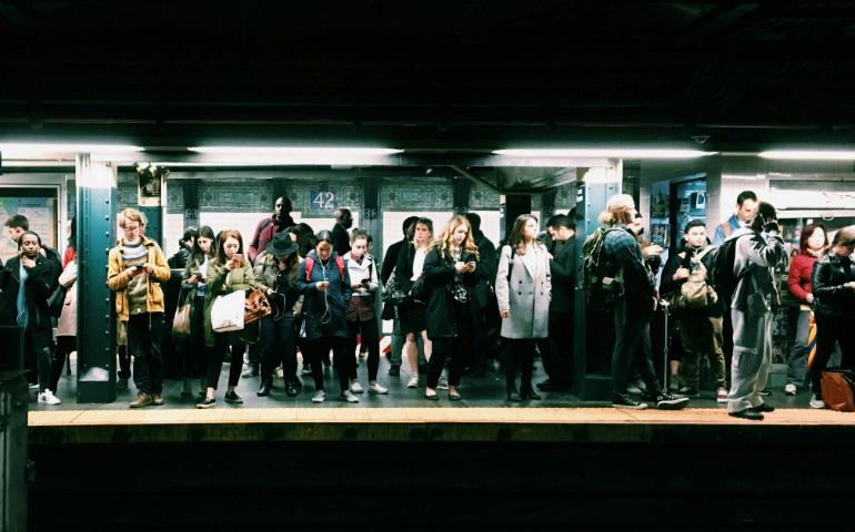 Group of People Waiting at Subway