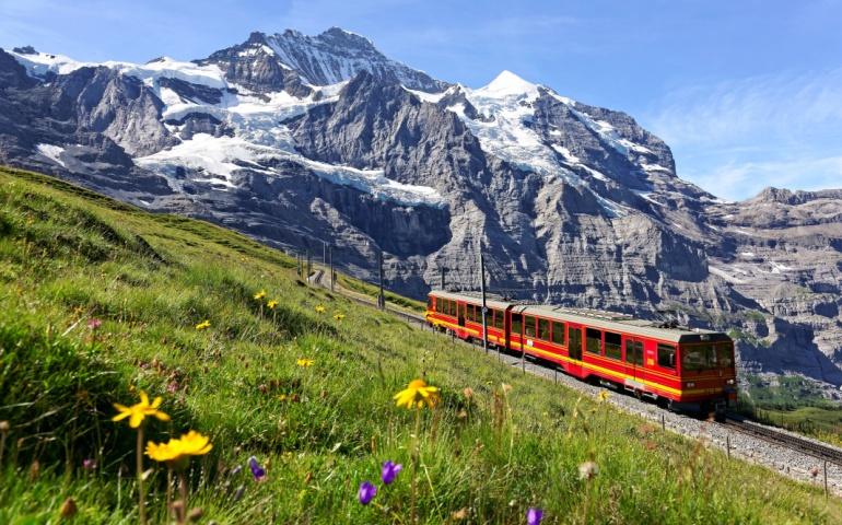 Train crossing the scenic Bernese Oberland, Switzerland