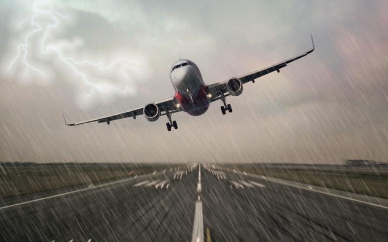 Thunderstorm During Landing at the Airport Runway