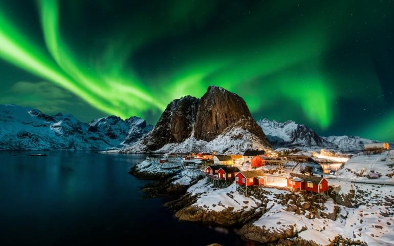 Aurora Borealis lighting up Hamnoy village in the Lofoten Islands, Norway