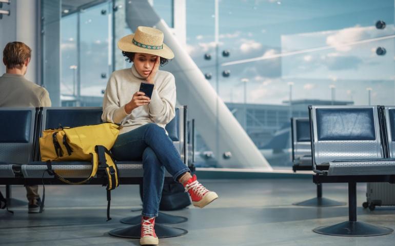 Woman Waits for Flight