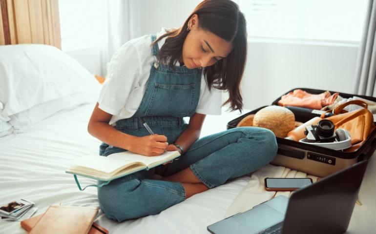 Woman writing in her journal