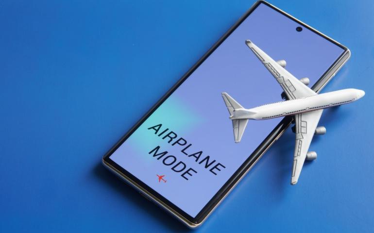 Disabling communication functions of gadgets during flight