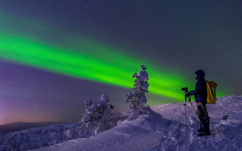Aurora Borealis over Kandalaksha mountains, Murmansk, Russia.