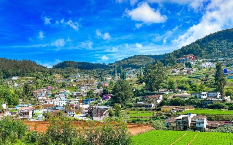 Wide-angle scenic cityscape view of the hill station in Ooty