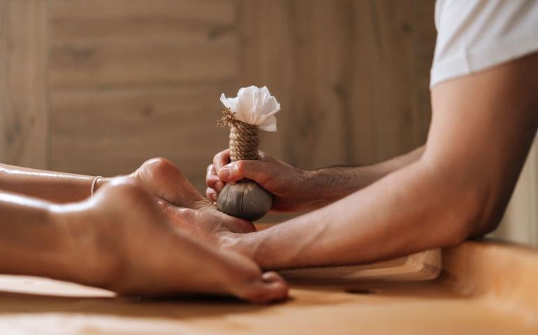  A young woman getting feet massage