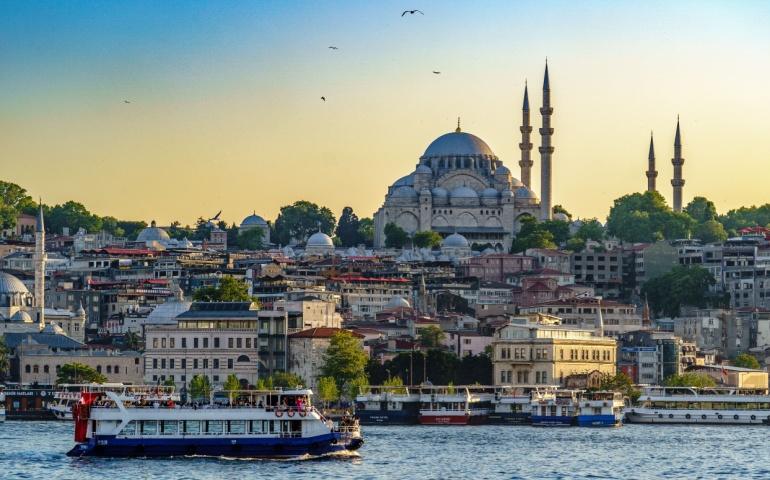 Ferry sailing on the Bosphorus with the Süleymaniye Mosque in the background
