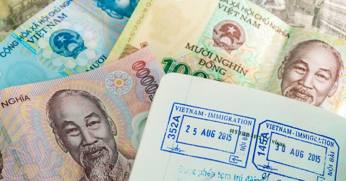 Visa passport stamp from vietnam and Vietnamese money (Dong)