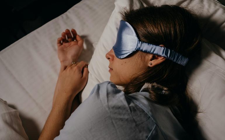 Woman wearing Eye Mask
