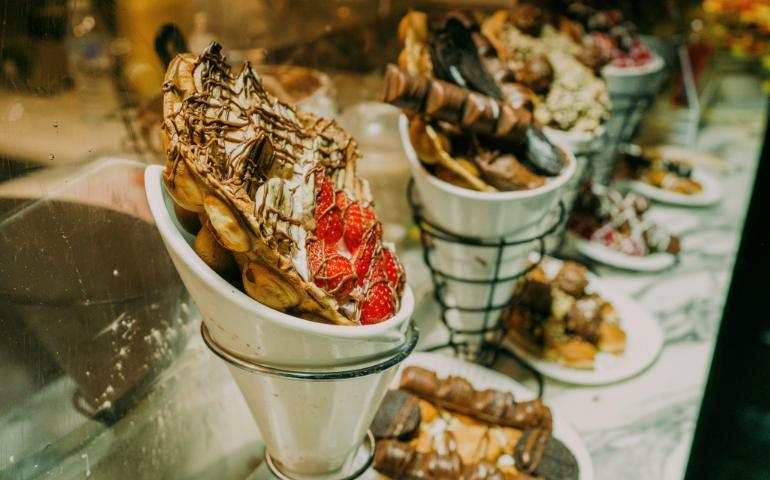 Pastries and Chocolate in a Showcase

