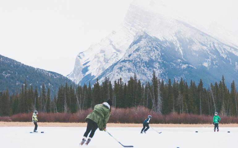 Children Playing Ice Hockey