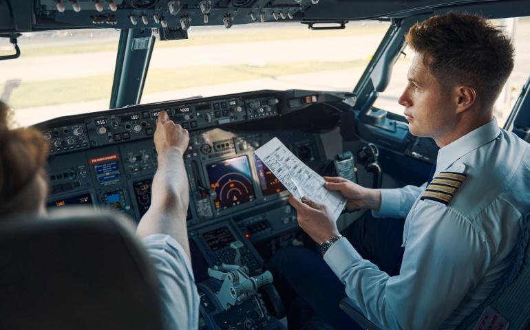 Airline Captain Sitting in the Cockpit