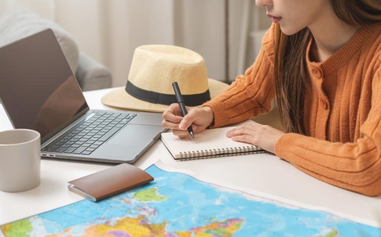 A woman planning her vacation