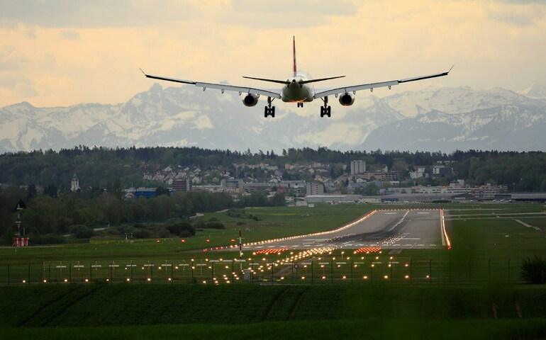 An aircraft landing on the runway