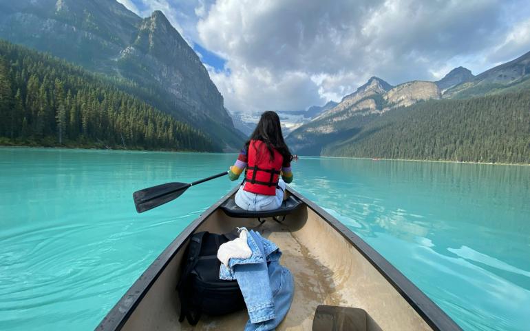 A Girl Kayaking on Lake Louise