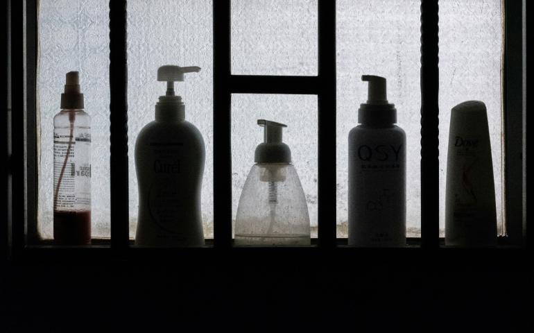 Toiletries Bottles on Shelf