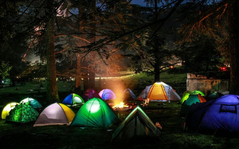 camping at night in the forest

