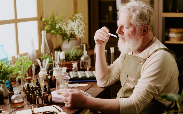 A perfumer trying a homemade scent, Grasse, France