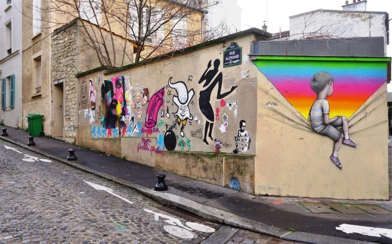 Graffiti mural painting by famous French street artist Seth Globepainter (Julien Malland) on Rue Barrault in the 13th arrondissement of the French capital.