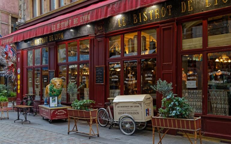 A traditional bouchon restaurant in a small street, Lyon France