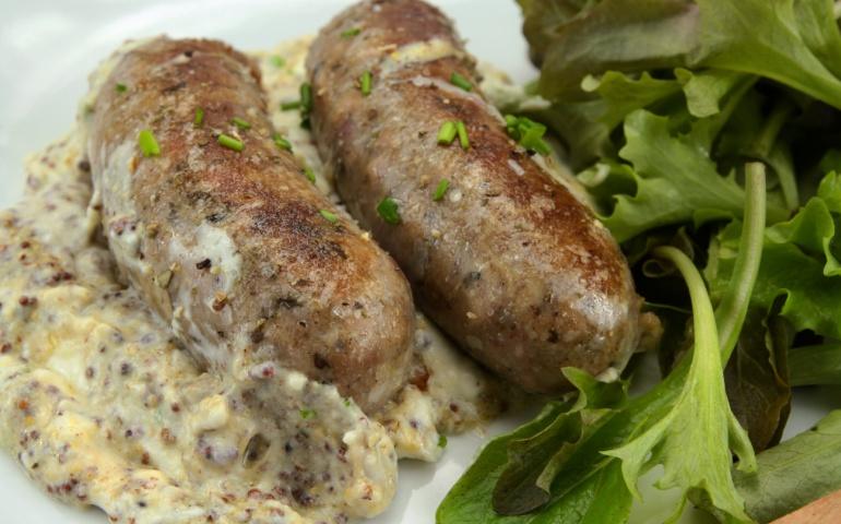Andouillette with mustard sauce and fresh cream. Lyon France