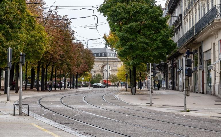 The roadway of Darcy Square with a view of the William Gate, Dijon, France