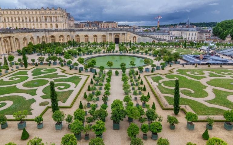 The famous Palace Versailles with beautiful gardens and fountains
