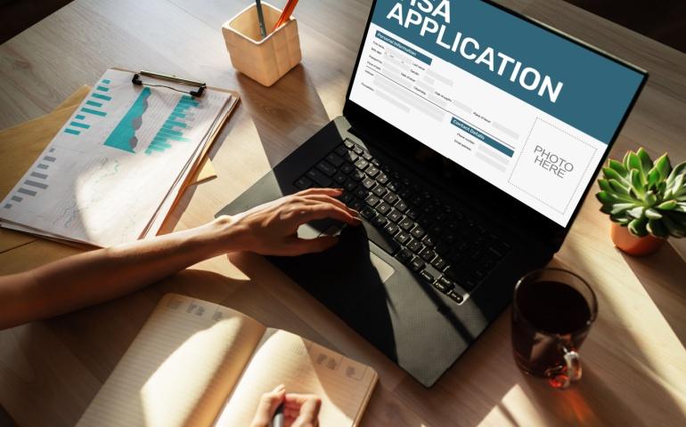 A person filling out an online visa application