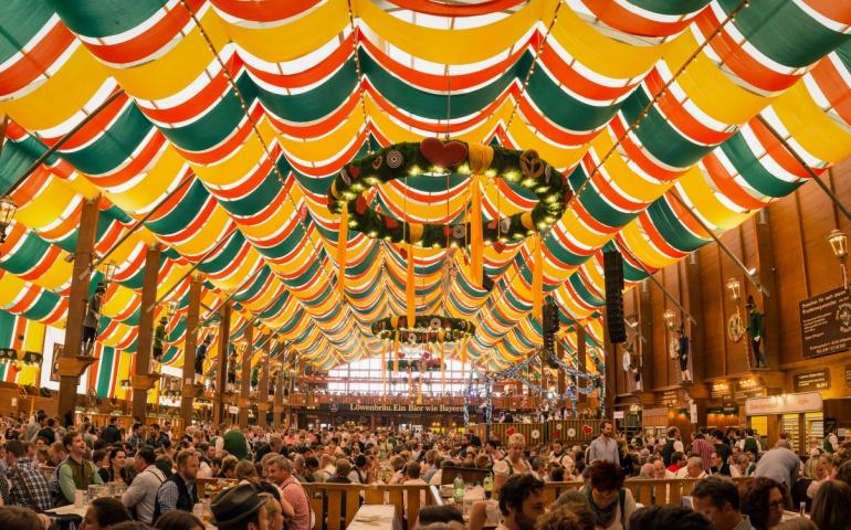People drinking in the Hippodrom Beer Tent on the Theresienwiese Oktoberfest