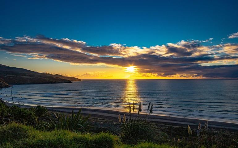 Beautiful landscape of sunset in Raglan New Zealand