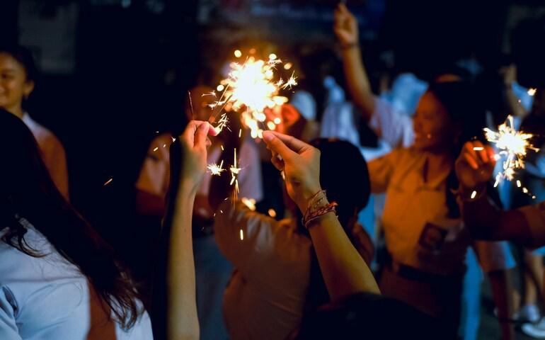 People playing with sparklers