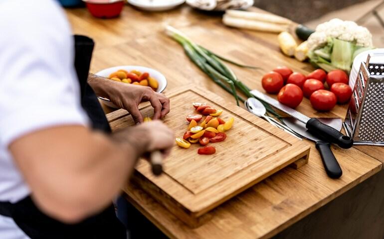 Person chopping vegetables
