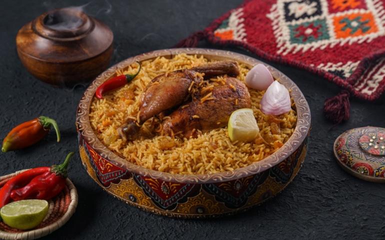 Chicken kabsa - homemade arabian rice, Saudi food.
          
