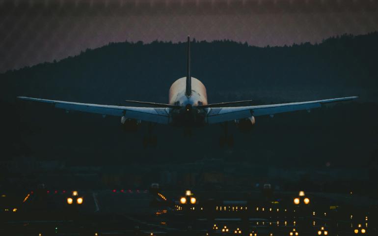 Airplane in the sky during night time