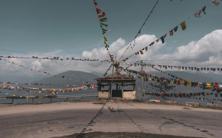 Road in Arunachal Pradesh Lined with Colourful Prayer Flags
