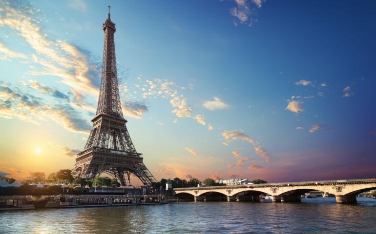 The Eiffel Tower and bridge Iena on the river Seine in Paris, France. - Europe