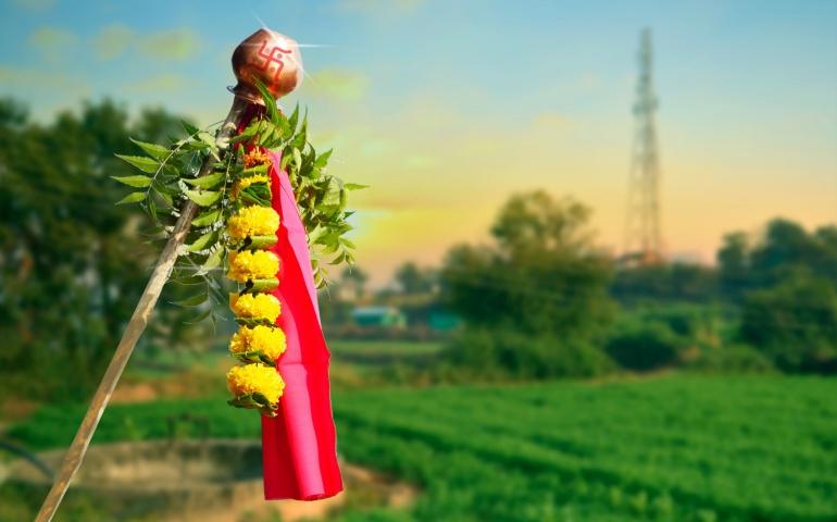 A traditional Gudi raised high to welcome the Marathi New Year.
