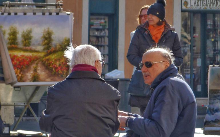 Elderly people talking to each other
