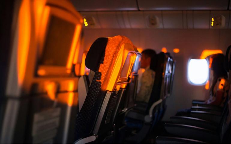 Sunset light falling on empty seats in the plane