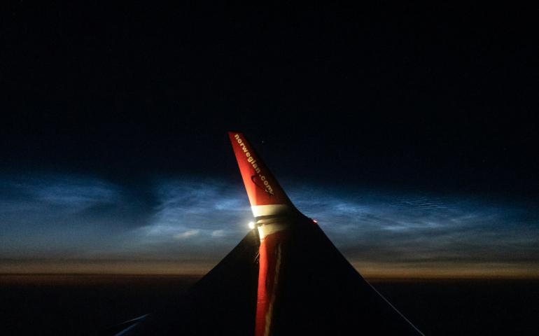 Wing of an Airplane at Night